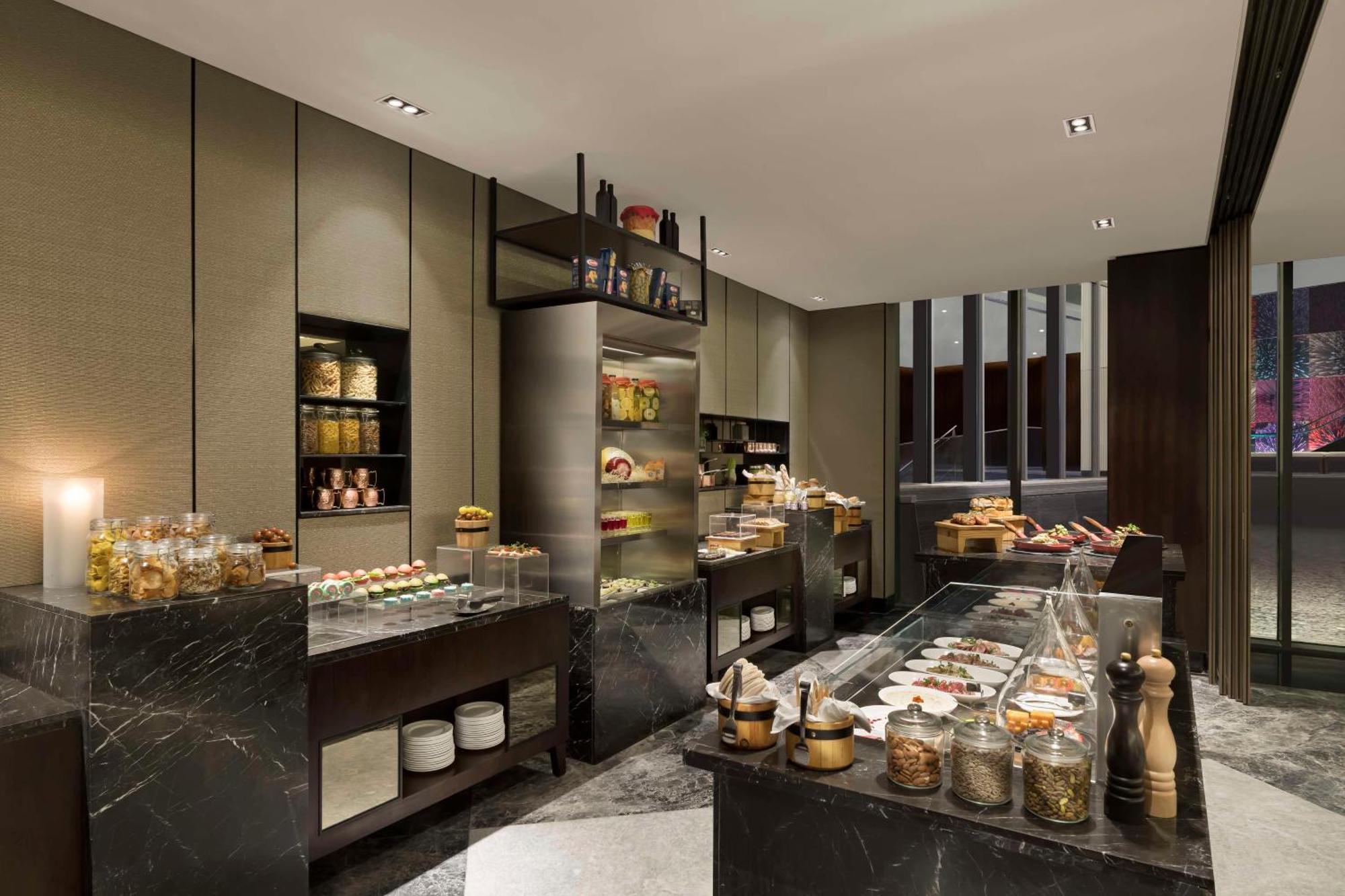 Hilton Bengaluru Embassy Manyata Business Park Otel Dış mekan fotoğraf