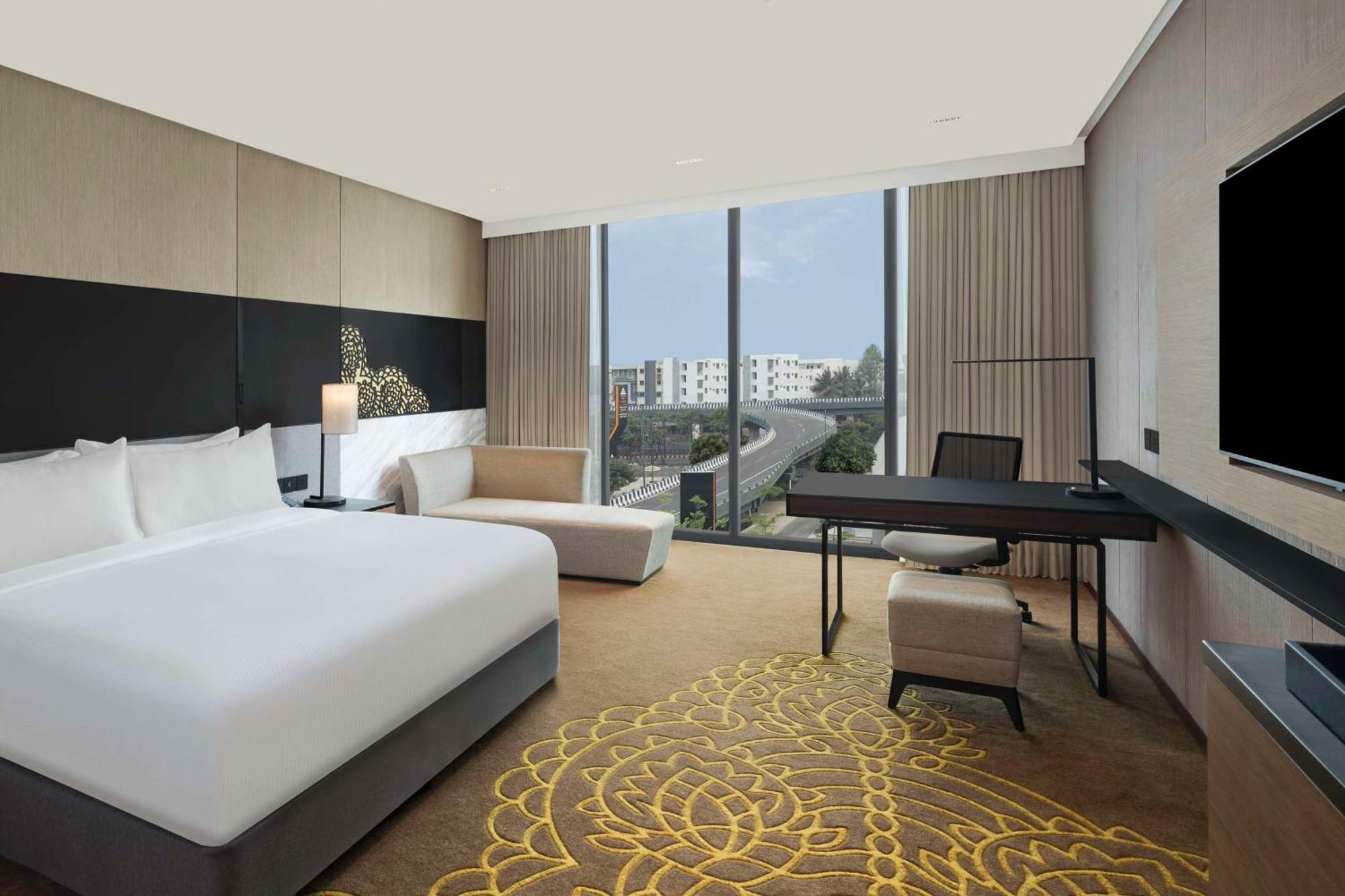 Hilton Bengaluru Embassy Manyata Business Park Otel Dış mekan fotoğraf