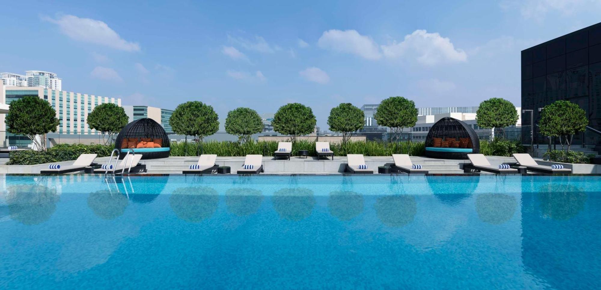 Hilton Bengaluru Embassy Manyata Business Park Otel Dış mekan fotoğraf