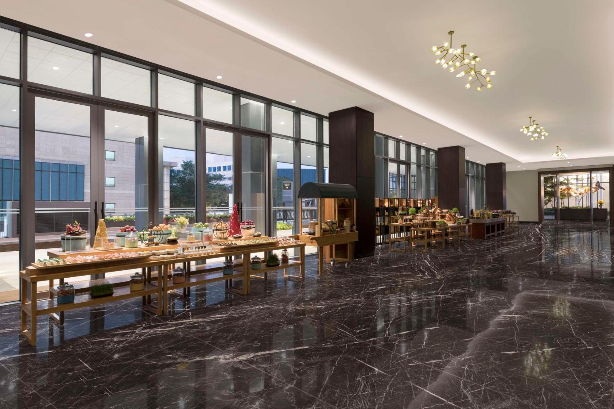 Hilton Bengaluru Embassy Manyata Business Park Otel Dış mekan fotoğraf
