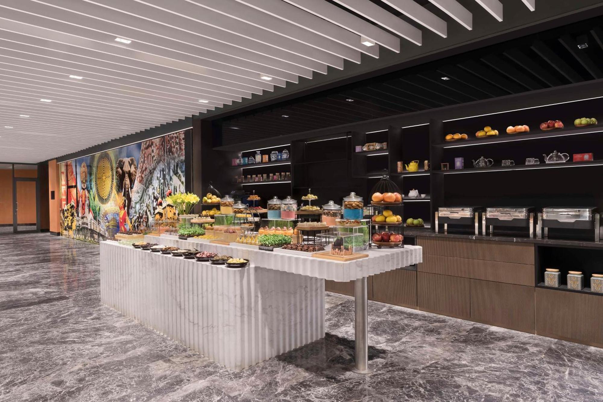 Hilton Bengaluru Embassy Manyata Business Park Otel Dış mekan fotoğraf