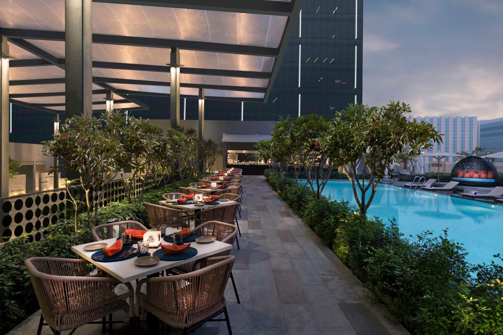 Hilton Bengaluru Embassy Manyata Business Park Otel Dış mekan fotoğraf